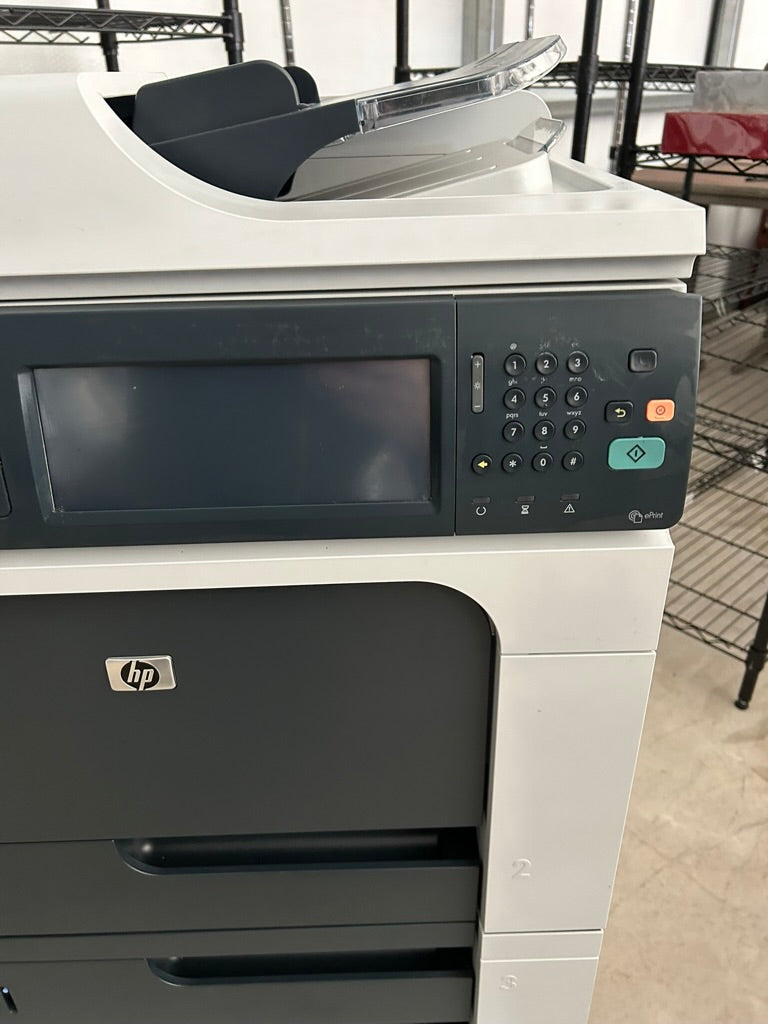 HP LaserJetM4555F all in one CE503A with extra trays/stand